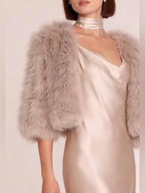 Linda Richards peachy pink / Champagne use one time in runway show. Size Med.